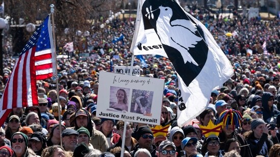 ST PAUL, MINNESOTA - MARCH 28: Demonstrators gather for a "No Kings" protest outside the State Capitol building on March 28, 2026 in St Paul, Minnesota. (Photo by Stephen Maturen / GETTY IMAGES NORTH AMERICA / Getty Images via AFP)(Getty Images via AFP)