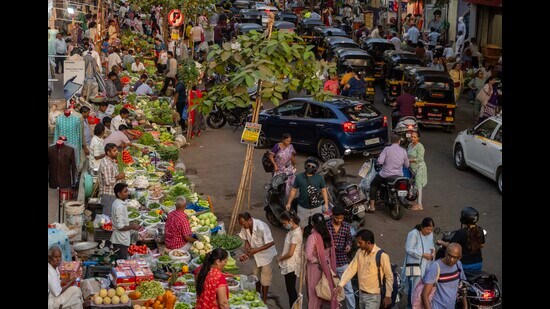 iMumbai, India - March 22, 2026: Hawkers line the busy roadside outside Vile Parle station, their colorful stalls and lively calls blending into the rhythm of the city’s daily rush in Mumbai, India, on Sunday, March 22, 2026. (Photo by Satish Bate/ Hindustan Times) (Hindustan Times)