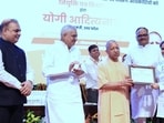 Chief minister Yogi Adityanath at a ceremony to distribute joining letters to 665 nursing officers in Lucknow on Sunday. (HT Photo)