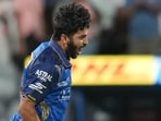 Mumbai Indians’ Shardul Thakur celebrates the wicket of Kolkata Knight Riders captain Ajinkya Rahane. (AP) Mumbai Indians’ Shardul Thakur celebrates the wicket of Kolkata Knight Riders captain Ajinkya Rahane. (AP)