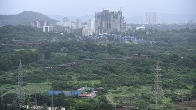 Mumbai, India - July 23, 2022: A bird’s eye view of the Metro-3 depot plot in Aarey Colony, showing the current extent of green cover, along with existing structures that were built by MMRCL prior to 2019, at Goregaon, in Mumbai, India, on Saturday, July 23, 2022. (Photo by Vijay Bate/HT Photo) (HT PHOTO) Mumbai, India - July 23, 2022: A bird’s eye view of the Metro-3 depot plot in Aarey Colony, showing the current extent of green cover, along with existing structures that were built by MMRCL prior to 2019, at Goregaon, in Mumbai, India, on Saturday, July 23, 2022. (Photo by Vijay Bate/HT Photo) (HT PHOTO)