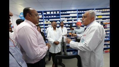 PGIMER director Dr Vivek Lal interacting with Rajesh Nair, vice-president, AMRIT pharmacy, after the store’s inauguration. (HT Photo) PGIMER director Dr Vivek Lal interacting with Rajesh Nair, vice-president, AMRIT pharmacy, after the store’s inauguration. (HT Photo)