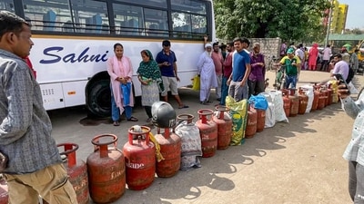People queue up to avail LPG cylinders amid ongoing supply crunch, in Dilshad Colony, Delhi, Saturday, March 28 (PTI) People queue up to avail LPG cylinders amid ongoing supply crunch, in Dilshad Colony, Delhi, Saturday, March 28 (PTI)