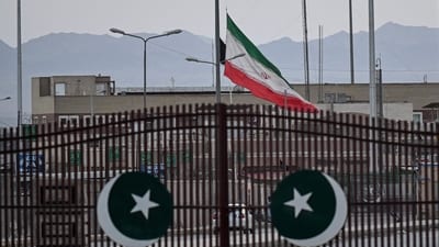 An Iranian flag flies at half-mast at the Pakistan-Iran border crossing at Taftan, Balochistan province (AFP) An Iranian flag flies at half-mast at the Pakistan-Iran border crossing at Taftan, Balochistan province (AFP)