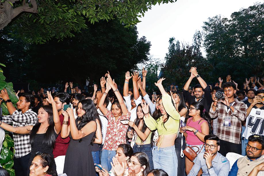 Students packed into the crowd, singing along with the performer late into the night