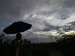 Dark clouds seen hovering over the skies at Nehru Place in Delhi on Monday