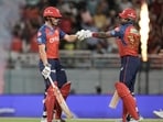 Cooper Connolly knocks gloves with Shreyas Iyer during the PBKS chase.