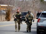 Michigan synagogue attacker's motive revealed: FBI members work on the site after the Michigan State Police reported an active shooting incident at the Temple Israel Synagogue in West Bloomfield, Michigan, U.S., March 12, 2026. 