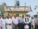 Punjab Bahujan Samaj Party (BSP) president Avtar Singh Karimpuri (in blue turban) with supporters at the site in Noorpur Jattan village of Hoshiarpur district on Tuesday, while workers restore the glass casing around Dr BR Ambedkar’s bust. (HT Photo) Punjab Bahujan Samaj Party (BSP) president Avtar Singh Karimpuri (in blue turban) with supporters at the site in Noorpur Jattan village of Hoshiarpur district on Tuesday, while workers restore the glass casing around Dr BR Ambedkar’s bust. (HT Photo)
