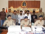 The four accused of the fake currency racket in police custody on Tuesday (HT Photo)