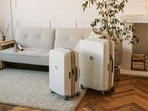 A practical trolley suitcase set ready for travel, showing a compact cabin case and larger check-in bag for organised packing. A practical trolley suitcase set ready for travel, showing a compact cabin case and larger check-in bag for organised packing.