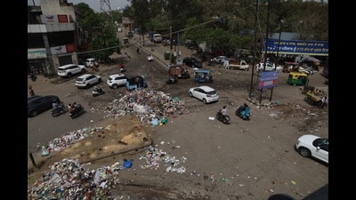 The protesting workers alleged that the situation had arisen due to a strike by drivers of garbage-carrying vehicles and loaders for the past three days, due to which the gates of the Tajpur dump remained closed. (HT Photo) The protesting workers alleged that the situation had arisen due to a strike by drivers of garbage-carrying vehicles and loaders for the past three days, due to which the gates of the Tajpur dump remained closed. (HT Photo)