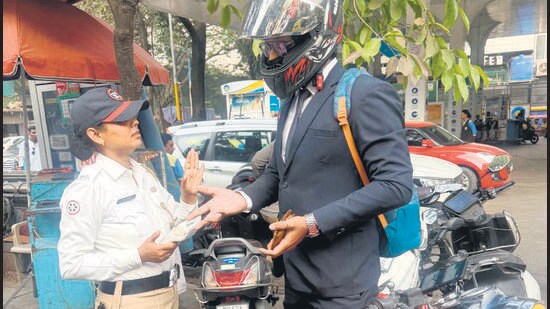 Pune traffic police crack down on violations; Over 1,200 triple seat riders penalised in special drive