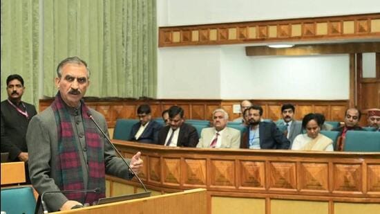 Chief minister Sukhvinder Singh Sukhu speaking in the assembly on Tuesday. He announced a complete rollback of the recent hike in entry tax for small vehicles entering Himachal Pradesh. (Deepak Sansta/HT)
