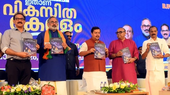 BJP National President Nitin Nabin, centre, the party's Kerala President Rajeev Chandrasekhar, second left, and others during the release of NDA's election manifesto for the upcoming state Assembly polls. (PTI)