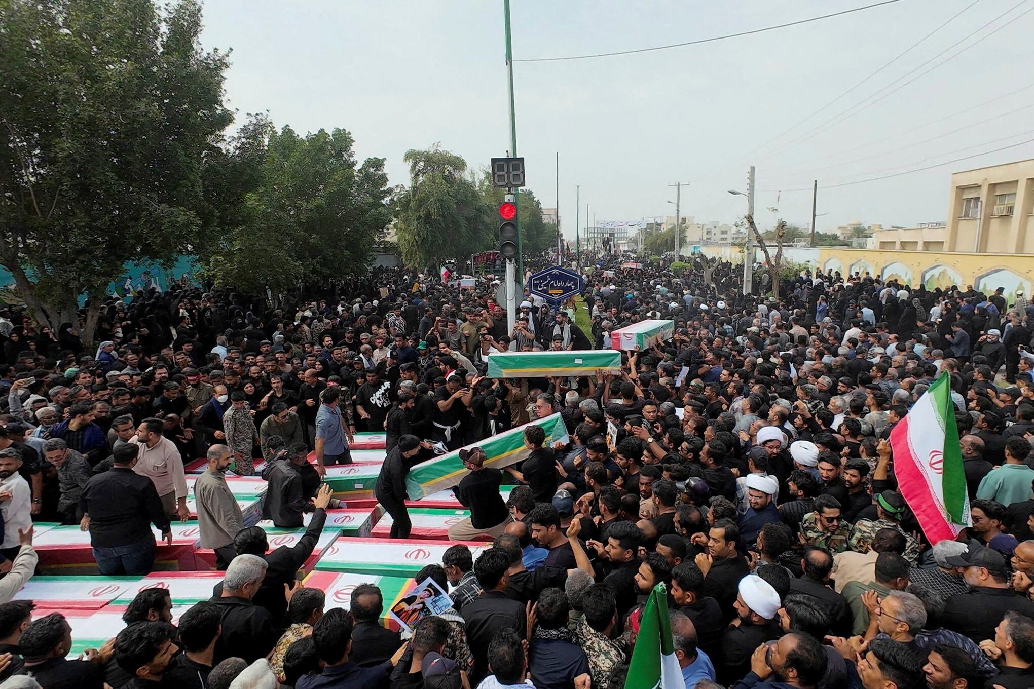 People attend the funeral of the victims following a reported strike on a school in Minab, Iran, March 3, 2026. (REUTERS)