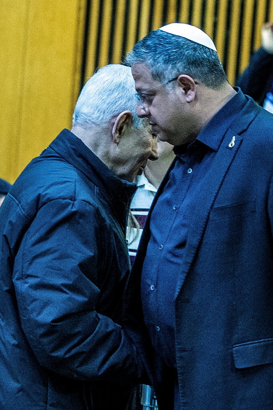 Israel's PM Benjamin Netanyahu and his far-right ally and minister Itamar Ben-Gvir shake hands at the Knesset, the Israeli parliament. (Reuters File Photo)