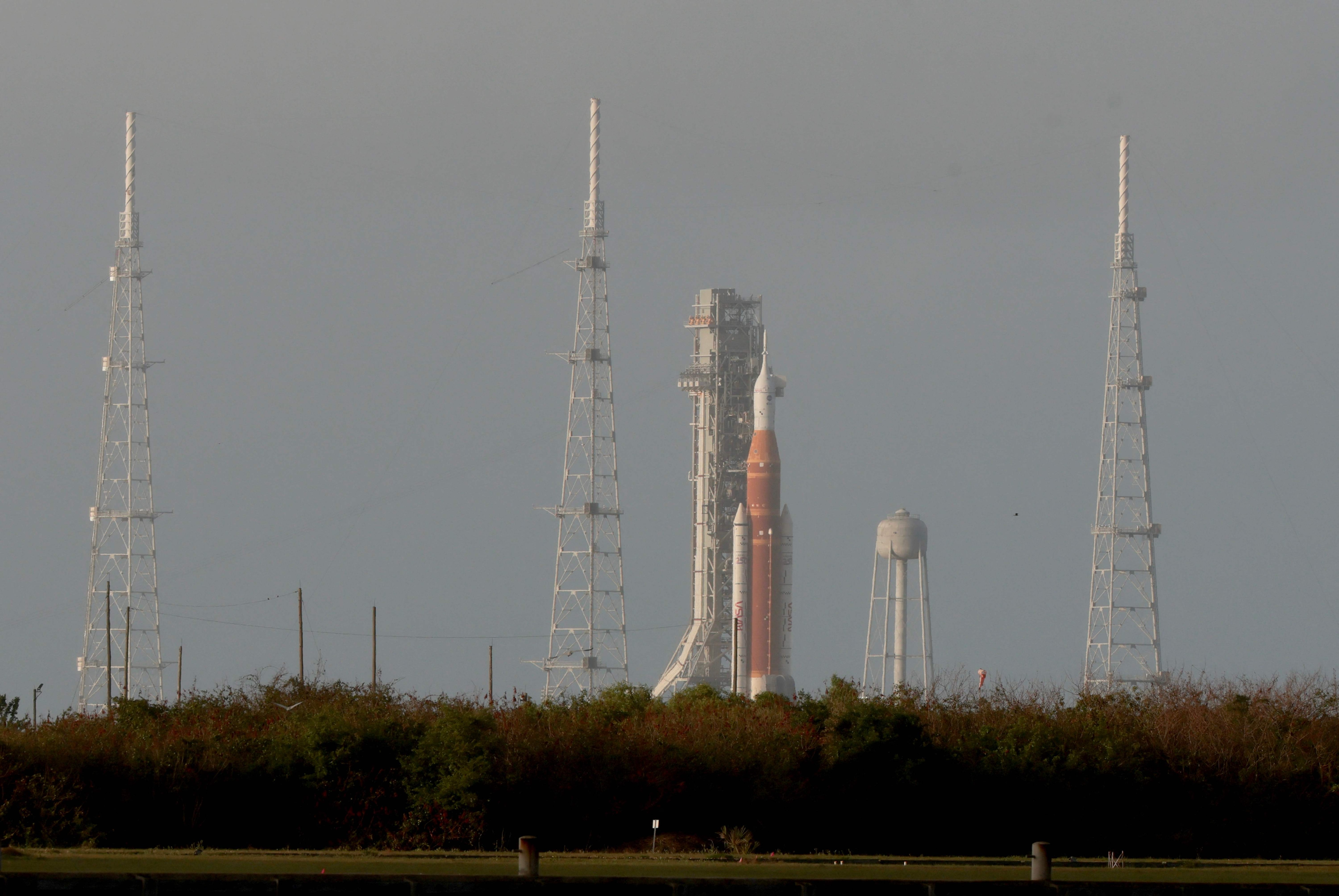 CAPE CANAVERAL, FLORIDA - MARCH 30: NASA's Artemis II Space Launch System rocket and Orion spacecraft sit on Launch Pad 39B at the Kennedy Space Center on March 30, 2026, in Cape Canaveral, Florida. The rocket is being prepared for an April 1, 2026 launch for a 10-day mission, which is scheduled to take four astronauts around the Moon and back to Earth. Joe Raedle/Getty Images/AFP (Photo by JOE RAEDLE / GETTY IMAGES NORTH AMERICA / Getty Images via AFP) (Getty Images via AFP) CAPE CANAVERAL, FLORIDA - MARCH 30: NASA's Artemis II Space Launch System rocket and Orion spacecraft sit on Launch Pad 39B at the Kennedy Space Center on March 30, 2026, in Cape Canaveral, Florida. The rocket is being prepared for an April 1, 2026 launch for a 10-day mission, which is scheduled to take four astronauts around the Moon and back to Earth. Joe Raedle/Getty Images/AFP (Photo by JOE RAEDLE / GETTY IMAGES NORTH AMERICA / Getty Images via AFP) (Getty Images via AFP)