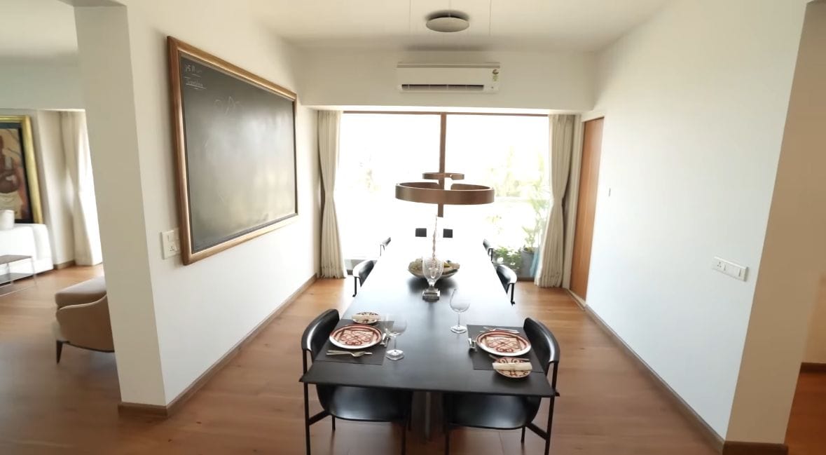 Art defines the personality of Jackie Shroff's Bandra home, showcasing a blend of minimalist interiors and personal touches. (YouTube/@FarahKhan) Art defines the personality of Jackie Shroff's Bandra home, showcasing a blend of minimalist interiors and personal touches. (YouTube/@FarahKhan)