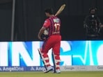 Lucknow Super Giants' captain Rishabh Pant walks off the field after losing his wicket during the Indian Premier League cricket match 