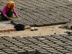India was among the early adopters of statutory minimum wages, introducing the Minimum Wages Act in 1948, empowering states to set wage floors for selected “scheduled employments” with weak bargaining power, such as agriculture, construction, brick kilns, bakeries, automobile workshops, and others. (AP)