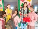 Kids being welcomed at a school. (Sourced)