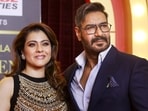 Ajay Devgn (Seen here with actor-wife Kajol) turns 57. Happy birthday to the man who knows how to balance the commercial with the classic. (File Photo/ PTI)