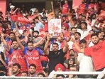 Punjab Kings fans in a joyous mood after the team beat Gujarat Titans in the IPL tie at the Punjab Cricket Association stadium in New Chandigarh on Tuesday. (Keshav Singh/HT)