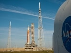 NASA's Artemis II lunar flyby mission, with the next-generation moon rocket, the Space Launch System (SLS) rocket and the Orion crew capsule, sits on Pad 39B ahead of the launch of the Artemis II mission at the Kennedy Space Center in Cape Canaveral, Florida, U.S.,  March 31, 2026. (REUTERS/Brendan McDermid)     