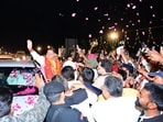 Chief Minister Pushkar Singh Dhami being welcomed by supporters during his road show in Udham Singh Nagar district.
