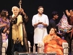 Javed Siddiqui and Nadira Babbar receiving The Thespian Award during the event in Lucknow