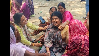 Family members of victims mourn outside a hospital after a stampede at the Sheetla Mata temple killed at least eight devotees and injured eight, in Bihar Sharif, Nalanda district, on Tuesday. (PTI) Family members of victims mourn outside a hospital after a stampede at the Sheetla Mata temple killed at least eight devotees and injured eight, in Bihar Sharif, Nalanda district, on Tuesday. (PTI)