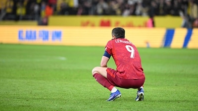 Robert Lewandowski reacts after Poland failed to qualify for the FIFA World Cup. (AFP) Robert Lewandowski reacts after Poland failed to qualify for the FIFA World Cup. (AFP)