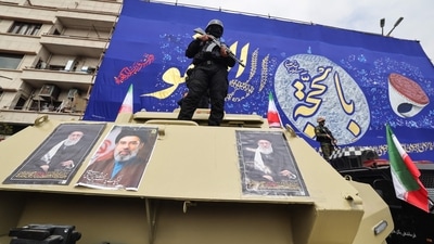 Members of the security forces stand guard on armoured vehicles plastered with portraits of Ali Khamenei (L and R) and of his son, Iran's new supreme leader, Mojtaba Khamenei, during the funerals of IRGC commanders, army commanders and others. (AFP) Members of the security forces stand guard on armoured vehicles plastered with portraits of Ali Khamenei (L and R) and of his son, Iran's new supreme leader, Mojtaba Khamenei, during the funerals of IRGC commanders, army commanders and others. (AFP)