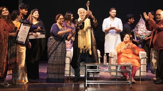 Javed Siddiqui and Nadira Babbar receiving The Thespian Award during the event in Lucknow