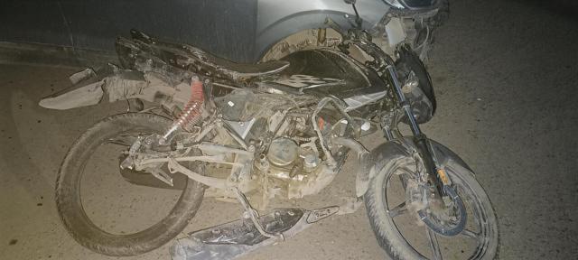 The mangled and broken remains of the victim’s motorcycle. (HT) The mangled and broken remains of the victim’s motorcycle. (HT)