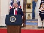 US President Donald Trump speaks about the Iran war from the Cross Hall of the White House