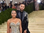 Stephen Curry and his wife Ayesha Curry pictured.