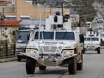 FILE PHOTO: UNIFIL vehicles drive on a main road in Qlayaa, southern Lebanon. (REUTERS)