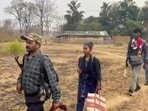 Bijapur: Senior Maoist commander Papa Rao, a member of the Dandakaranaya Special Zonal Committee (DKSZC) and in-charge of south Sub Zonal Bureau of Maoists, with his team members after their surrender, in Bijapur district, Chhattisgarh, Tuesday, March 24, 2026. (PTI Photo) (PTI03_24_2026_000325B)