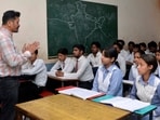 Students during a session at a government school in Ludhiana on Wednesday. (HT Photo) Students during a session at a government school in Ludhiana on Wednesday. (HT Photo)