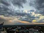Rain clouds cover the skyline above the Film City on a rainy evening, at Sector-16, in Noida, UP