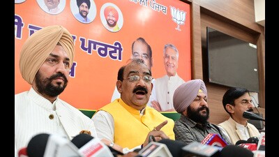 Punjab BJP working president Ashwani Sharma along with other senior Leaders in Chandigarh on Thursday. (Ravi Kumar/HT)