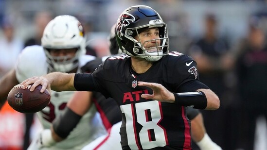 Former Atlanta Falcons quarterback Kirk Cousins throws against the Arizona Cardinals (AP)