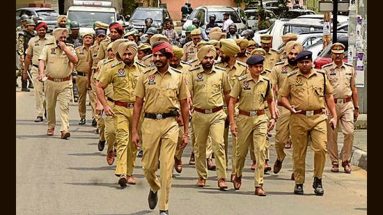 Police personnel in Punjab are not being granted weekly off due to staff shortages, despite the Punjab Police Rules stipulating that they are entitled to one day of rest every week. (HT Photo)