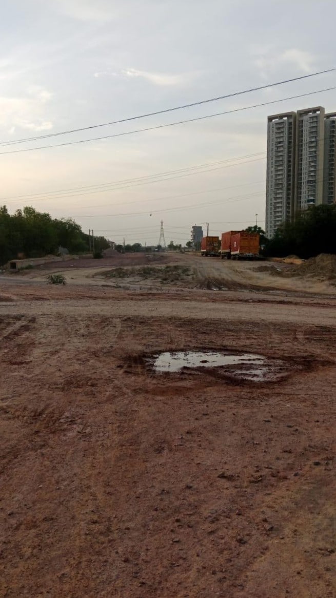 GMDA says tree clearance slowed project; drain work nearly complete, carriageway underway as multiple societies face daily access issues. (HT) GMDA says tree clearance slowed project; drain work nearly complete, carriageway underway as multiple societies face daily access issues. (HT)