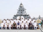 Union defence minister Rajnath Singh in a group photo at the commissioning ceremony of INS Taragiri in Visakhapatnam on Friday, April 3.