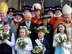 Members of the Yeomen of the Guard, Britain's King Charles, Queen Camilla and The Right Reverend Gregory Cameron, Bishop of St Asaph pose for a formal photograph after the Royal Maundy Service at St Asaph Cathedral, in St Asaph, Wales, Britain, April 2, 2026. Chris Jackson/Pool via REUTERS(via REUTERS)