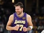 Luka Doncic #77 of the Los Angeles Lakers celebrates after a basket against the Indiana Pacers at Gainbridge Fieldhouse Luka Doncic #77 of the Los Angeles Lakers celebrates after a basket against the Indiana Pacers at Gainbridge Fieldhouse