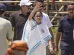 West Bengal chief minister Mamata Banerjee waves at a rally in support of TMC candidates ahead of the state assembly elections, at Harirampur in Dakshin Dinajpur, on Friday (PTI)